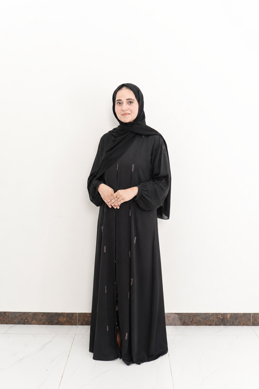 Black Minimalist Abaya with Subtle Metallic Detailing